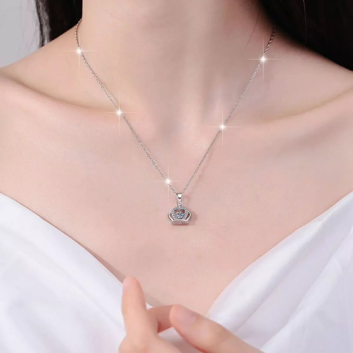 925 Sterling Silver Zircon Crown Pendant Necklace with intricate crown design, sparkling zircon stones, and a delicate chain.