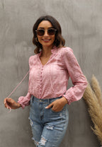 Bella Mia women's V-neck long sleeve shirt featuring floral embroidery and wood button details.