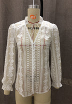 Bella Mia women's long sleeve V-neck shirt with floral embroidery and wood earrings, featuring a stylish and elegant design.