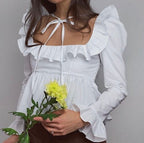 Bella Mia summer wind long sleeve ruffled shirt for women in solid color, featuring a stylish and lightweight design.