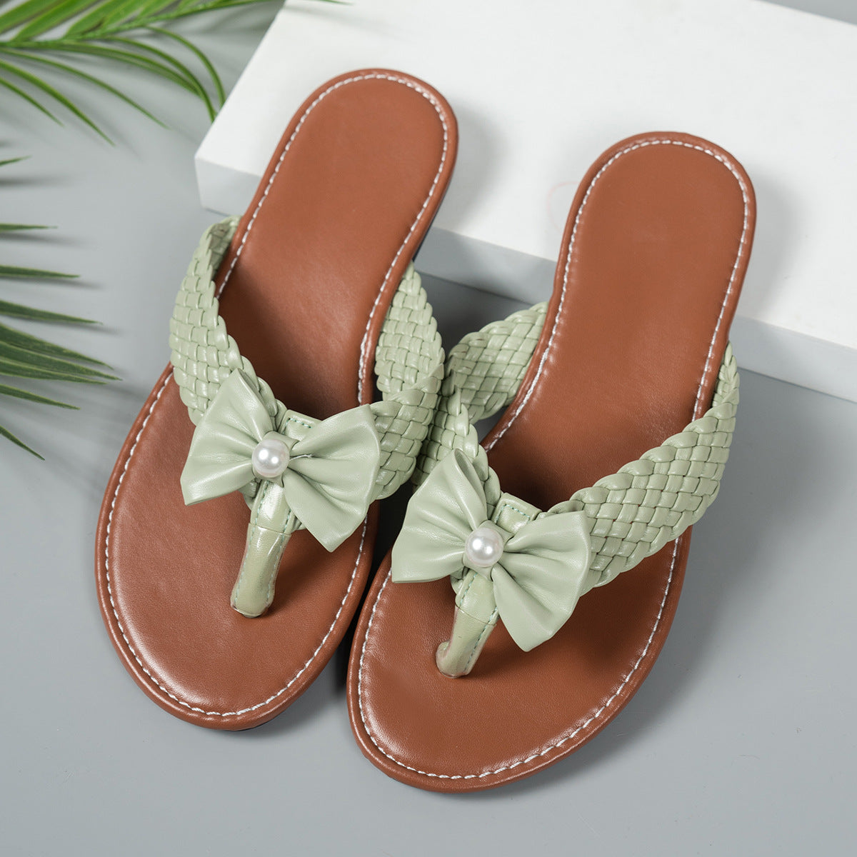 Shopimist toe post bow sandals featuring a stylish bow detail, open-toe design, and comfortable flat sole.