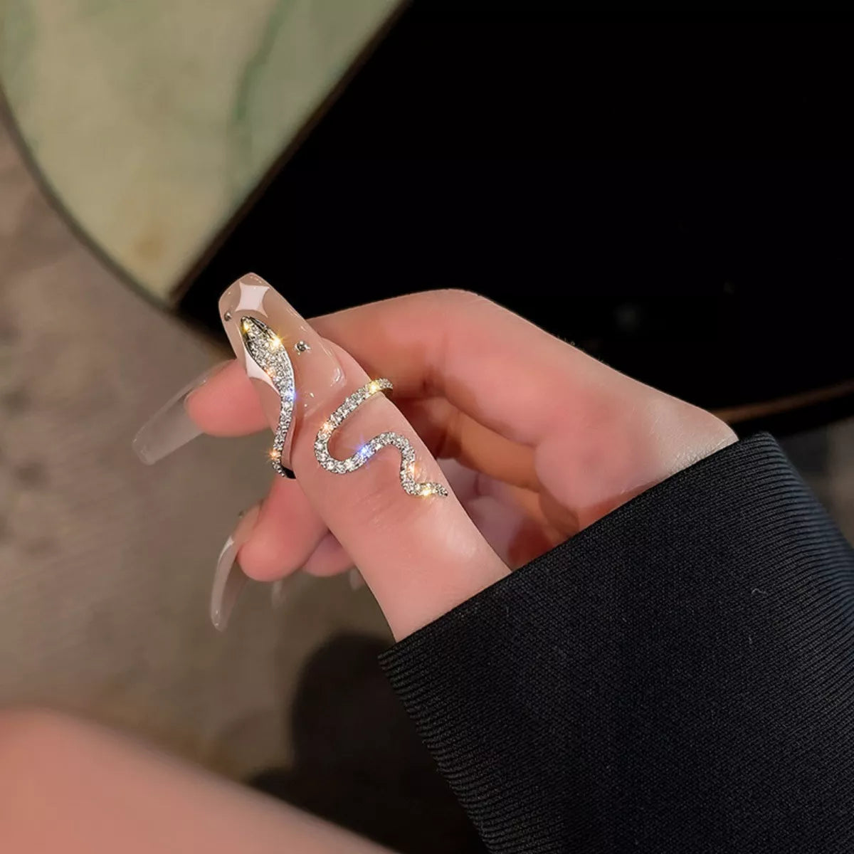 Sterling silver Zircon Snake Bypass Ring featuring a sleek, modern design with sparkling zircon stones, crafted by Plush Fashion Hub