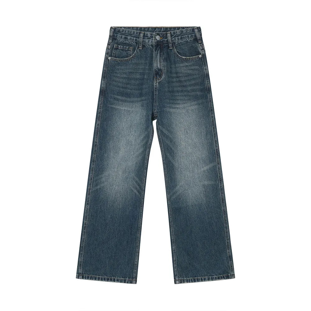 Plush Fashion Shop denim bootcut jeans with front and back pockets, classic blue wash, stylish and comfortable fit.