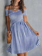 Women's off-shoulder striped waist-cinching midi dress by FitiqueFit, showing the casualwear dress with ruffled neckline and fitted waist.