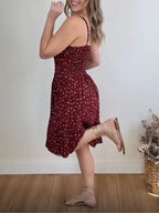 Floral print spaghetti strap midi dress with ruffle hem from Trendsi, featuring a flowy, feminine design perfect for summer.