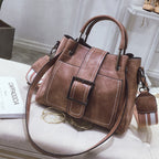 Elegant women's handbag by LadyShow.Store with a sleek design and neutral color, featuring a top handle and shoulder strap.