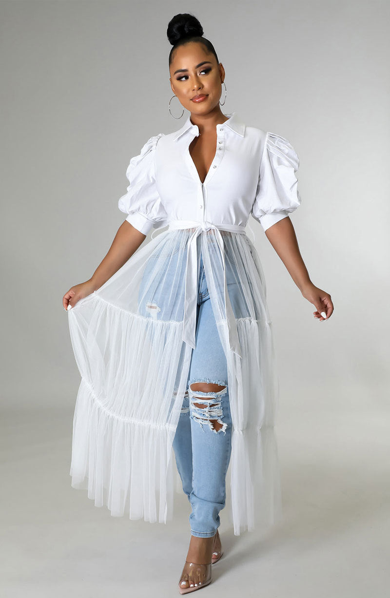 Women’s short sleeve casual summer shirt by Wanita Store, featuring a lightweight, niche design perfect for warm weather.