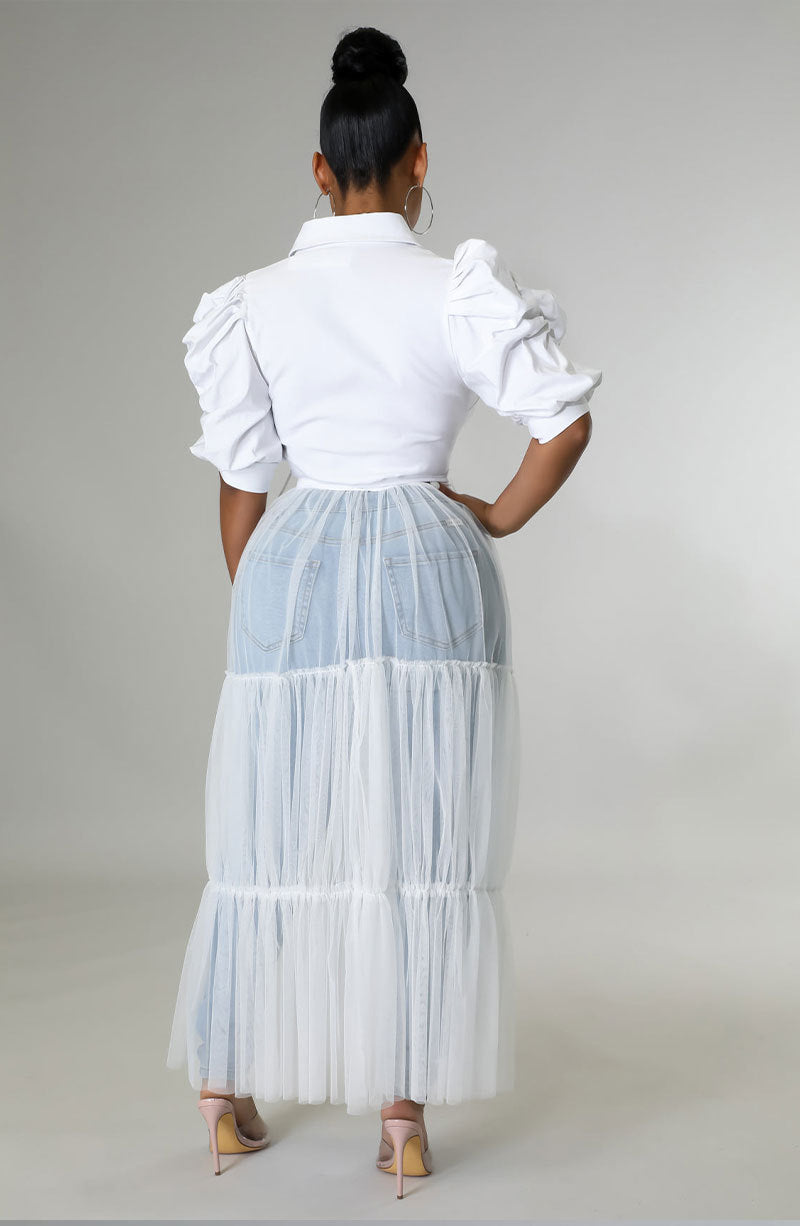 Women’s short sleeve casual summer shirt by Wanita Store, featuring a niche slightly relaxed fit, perfect for warm weather.