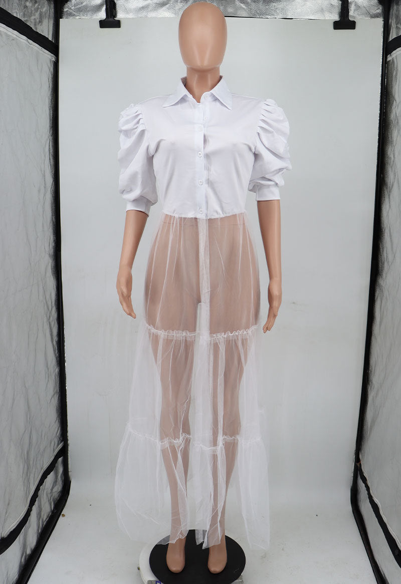 Women’s short sleeve casual summer shirt by Wanita Store, featuring a relaxed fit and lightweight fabric for warm weather.