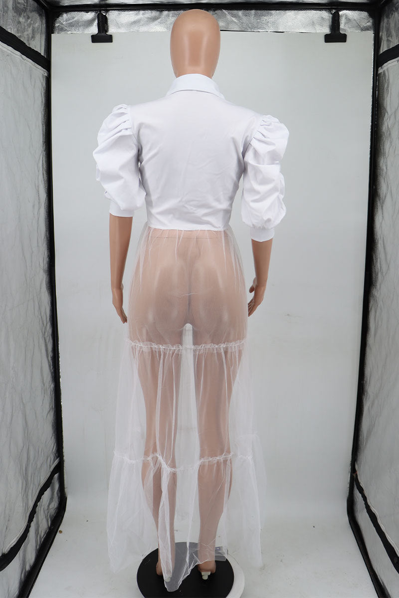 Short-sleeve women's casual summer shirt by Wanita Store, featuring a relaxed fit and lightweight fabric.