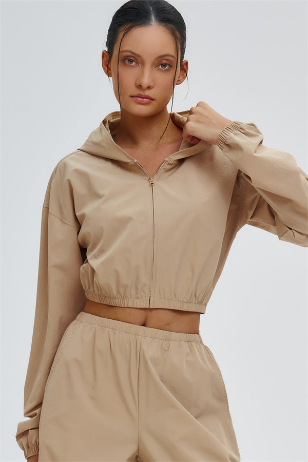 Fitglutes Activewear UV protection crop hoodie, lightweight athletic outerwear with a fitted design and breathable fabric.