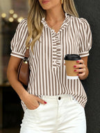 Women's striped puff sleeve blouse with ruffled details, featuring a stylish and feminine design by Trendsi.