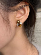 Tiger Eye stud earrings from Trendsi featuring polished, golden-brown gemstone studs with silver posts.