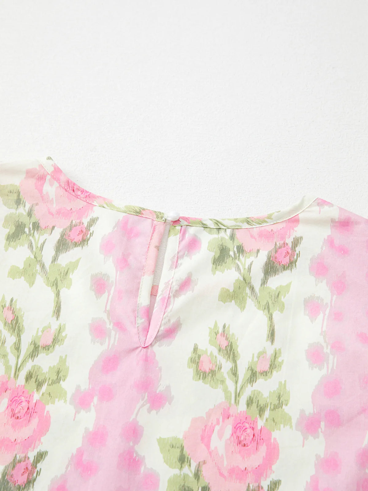 Floral print ruffled sleeve blouse by Plush Fashion Hub featuring vibrant flowers and feminine ruffle details on lightweight fabric.