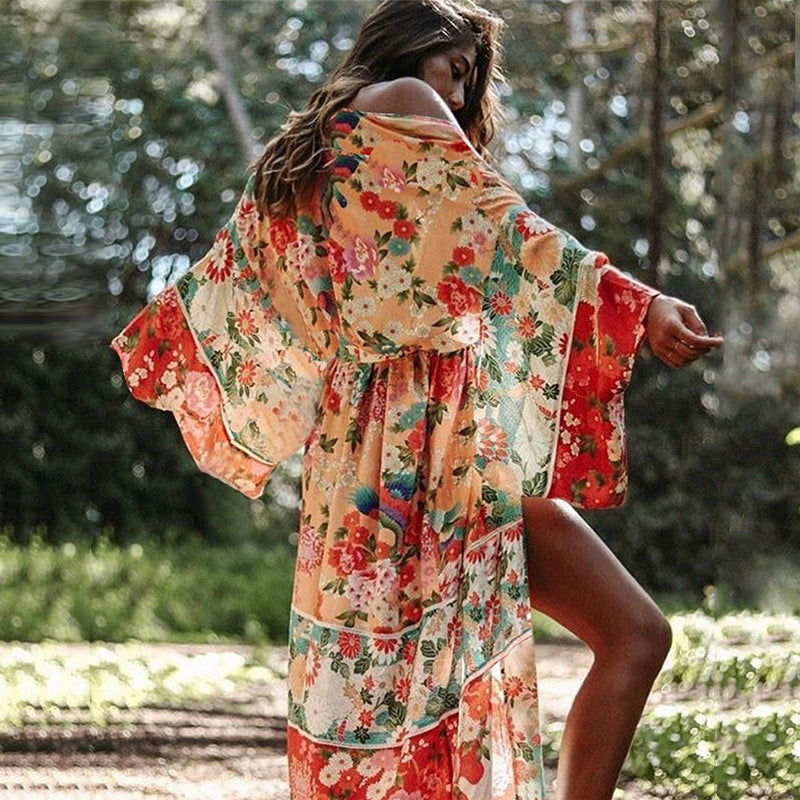 Plush Fashion Hub chiffon loose beach jacket over bikini swimsuit, lightweight women’s outerwear for sun protection at the beach.