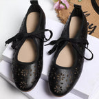 Floral cutout tied slip-on sandals from Plush Fashion Hub featuring open-toe design and decorative floral details.