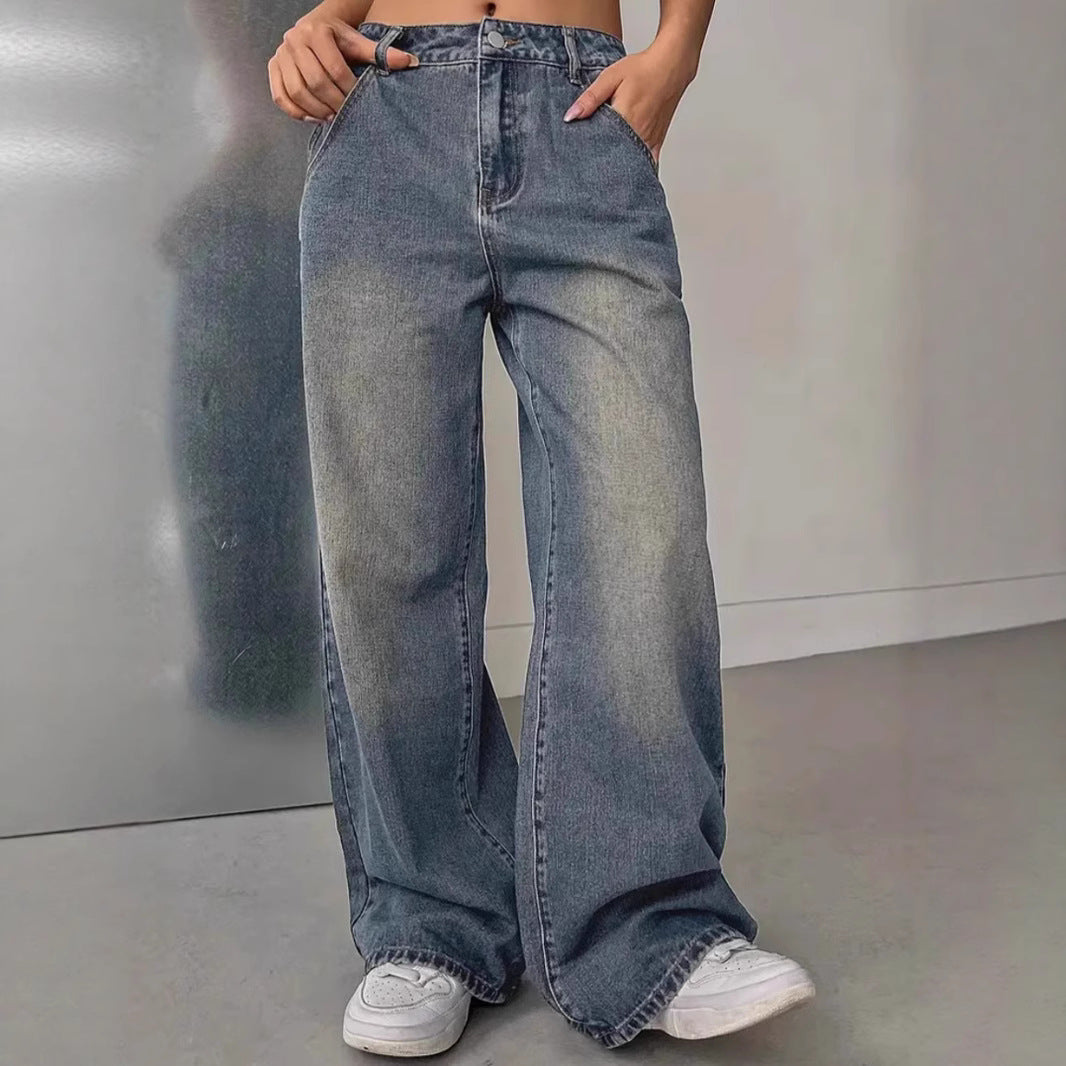 Women's washed vintage denim pants from Plush Fashion Hub, featuring a relaxed fit and distressed detailing.