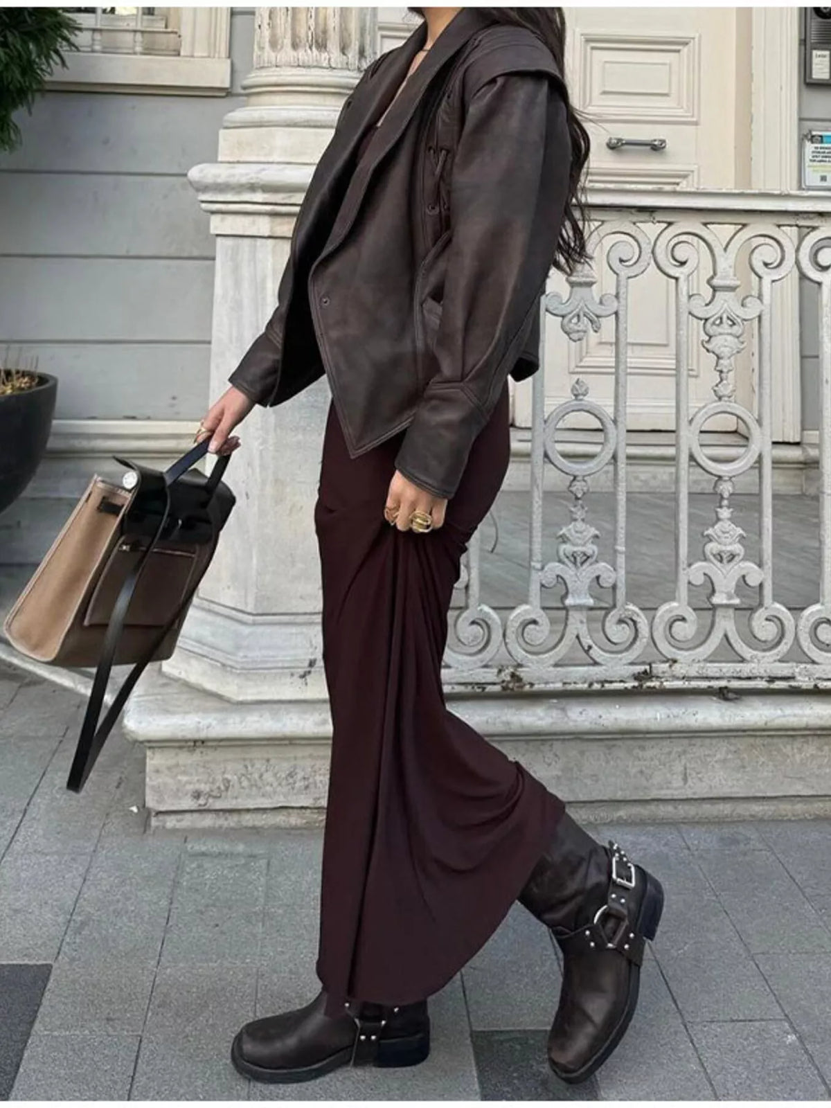 Women's leather belted jacket with shawl collar from Trendsi, featuring a stylish design and classic silhouette with belt detail.