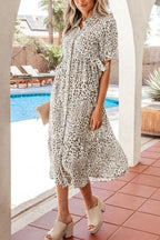 Women's leopard print button-down midi dress from Trendsi, featuring a casual chic style in a viscose blend fabric.