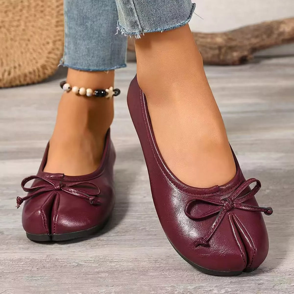 Trendsi Bow Decor Split Toe Slip-On Shoes featuring stylish bow detail and sleek design, perfect for casual or dressy outfits.