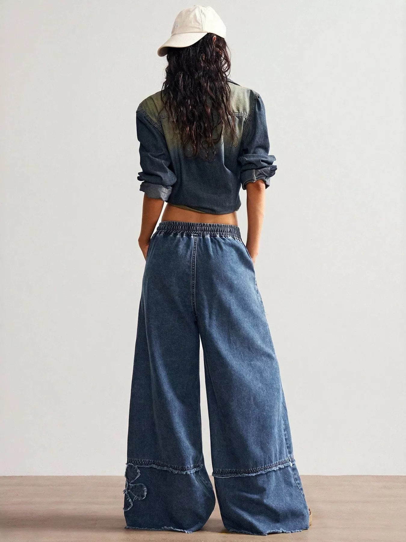 Shopimist floral appliques wide leg jeans with embroidered flower details and relaxed fit, shown in a stylish denim design.