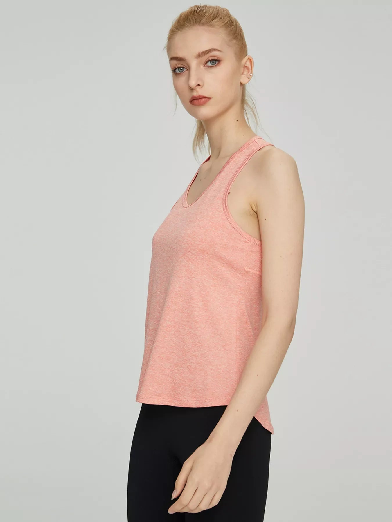 Shopimist breathable quick-drying active tank top, lightweight athletic sleeveless shirt for workout and sports activities.