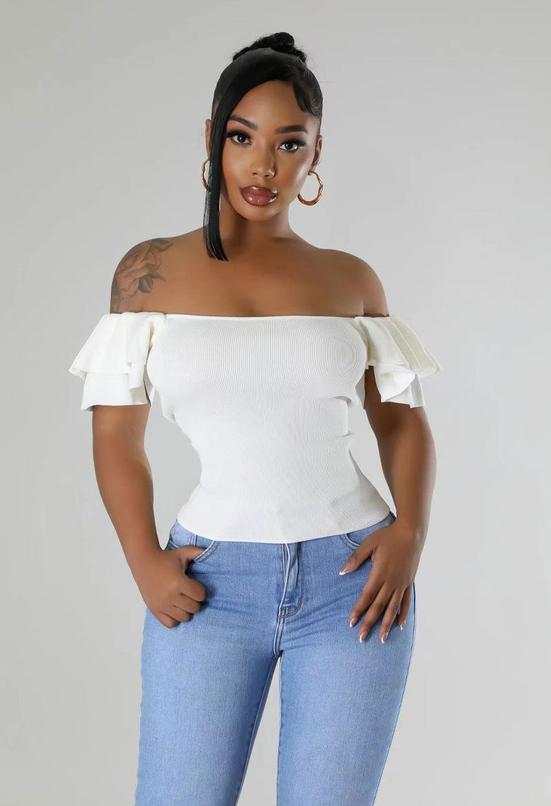 Women’s casual short sleeve T-shirt top from Wanita Store, featuring a comfortable fit and simple design.