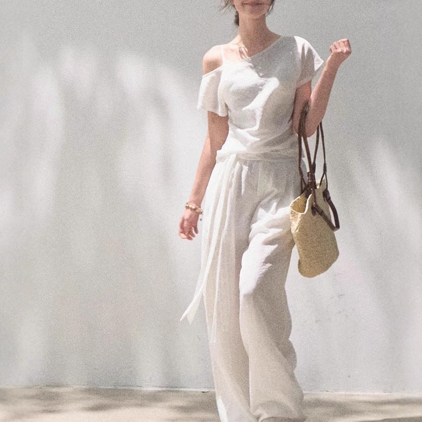 Linen off-shoulder asymmetric casual set by FitiqueFit in two colors, featuring relaxed fit top and matching pants, size S-L