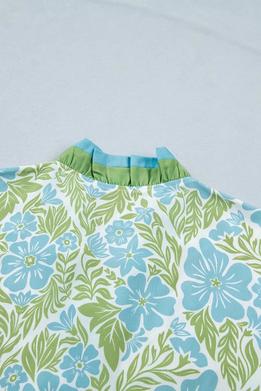 Floral print ruffle hem button-up mini dress from Plush Fashion Hub, featuring a feminine design with ruffles and a fitted silhouette.