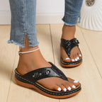 Women's comfortable toe post wedge sandals by Trendsi, stylish summer footwear with a cork wedge heel and neutral straps.