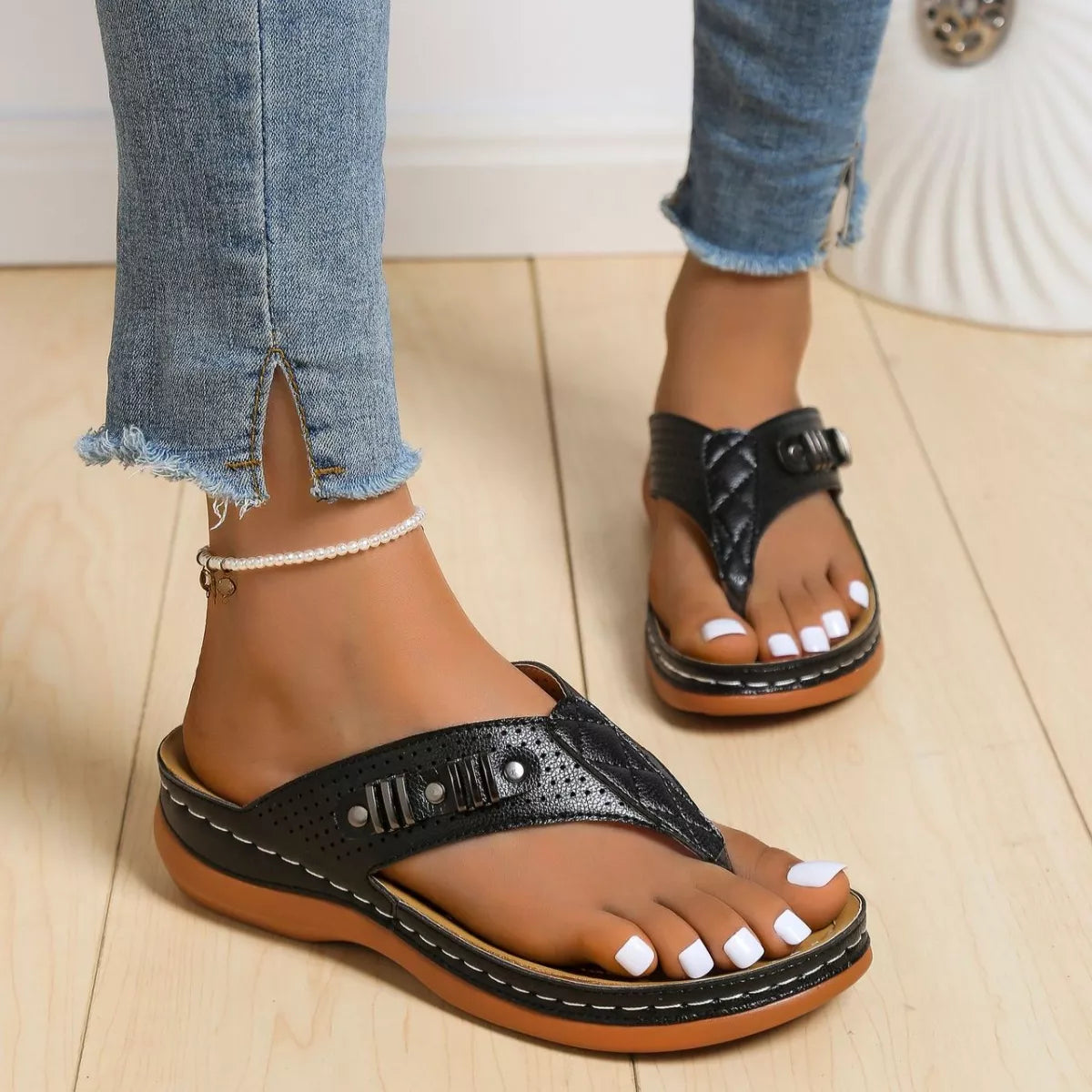 Women's comfortable toe post wedge sandals by Trendsi, stylish summer footwear with a cork wedge heel and neutral straps.