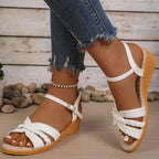 Open toe wedge sandals by Shopimist featuring tan straps and a cork heel, perfect for summer casual wear.