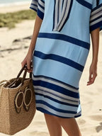 Plus size women's striped half-sleeve midi dress by Plush Fashion Hub, casual chic perfect for everyday wear.