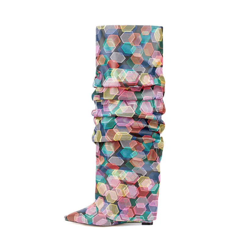 Knee-high boot with a colorful geometric hexagon pattern, pointed toe, and scrunched shaft on a white background.