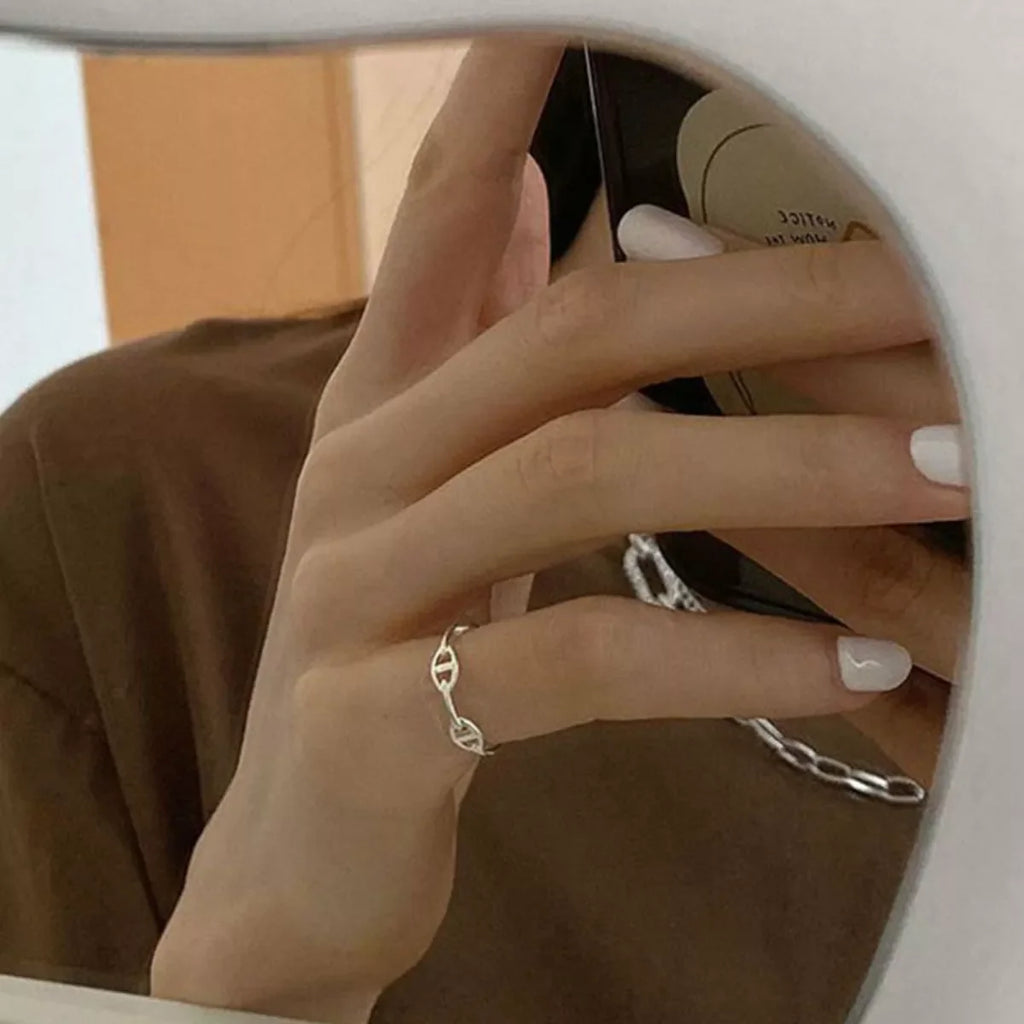 Sterling silver geometric ring by Shopimist featuring modern, minimalist design with clean lines and a polished finish.