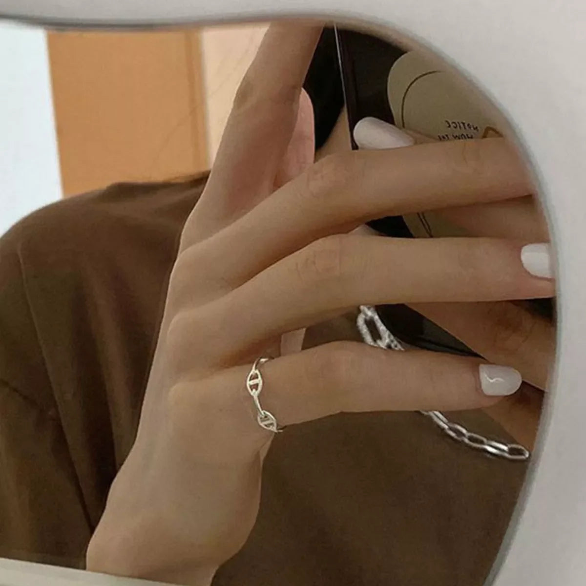 Sterling silver geometric ring from Plush Fashion Hub featuring modern design and polished finish, ideal for stylish accessories.