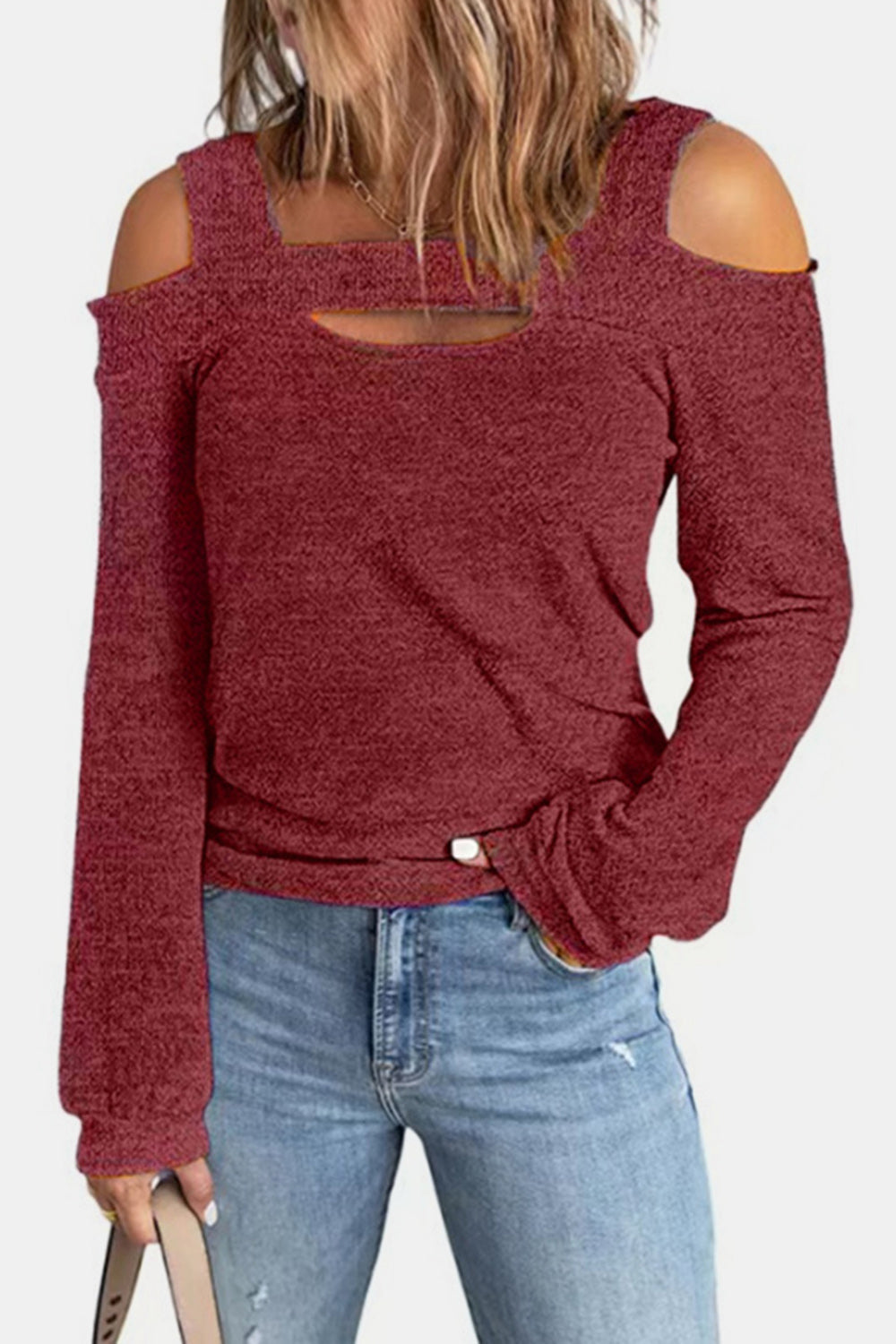 Women's elegant cold shoulder blouse by Trendsi, featuring cutout shoulders and a chic casual polyester top design.