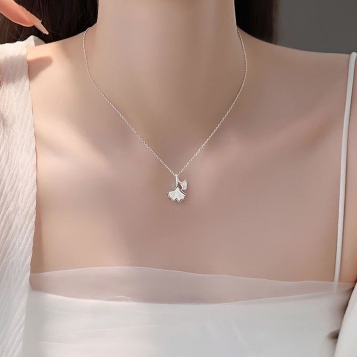 Ginkgo leaf pendant necklace by Shopimist featuring a detailed gold-tone ginkgo leaf charm on a delicate chain.
