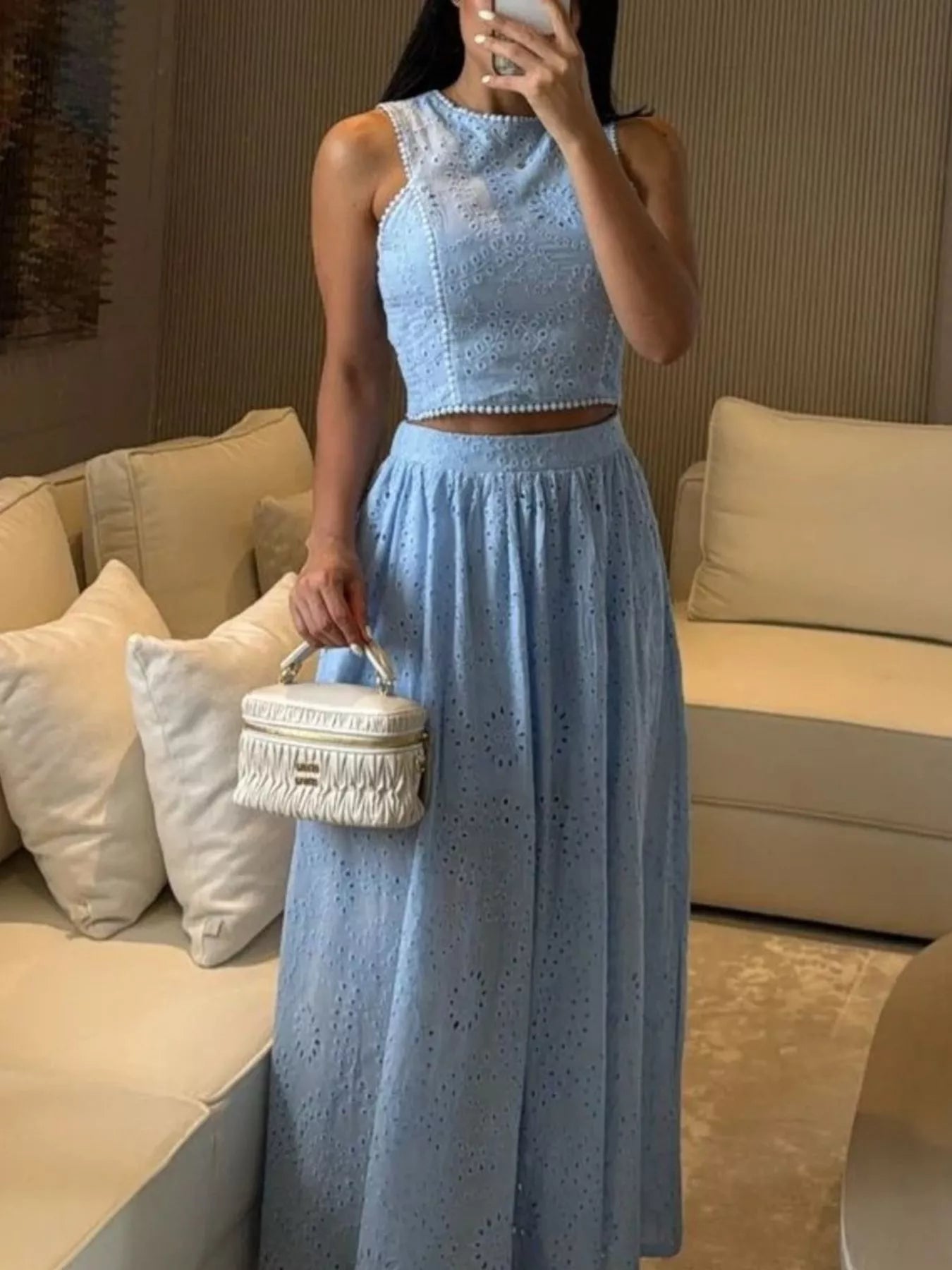 Trendsi eyelet crop top and maxi skirt set in white, featuring a stylish crop top with eyelet details and a flowing maxi skirt.