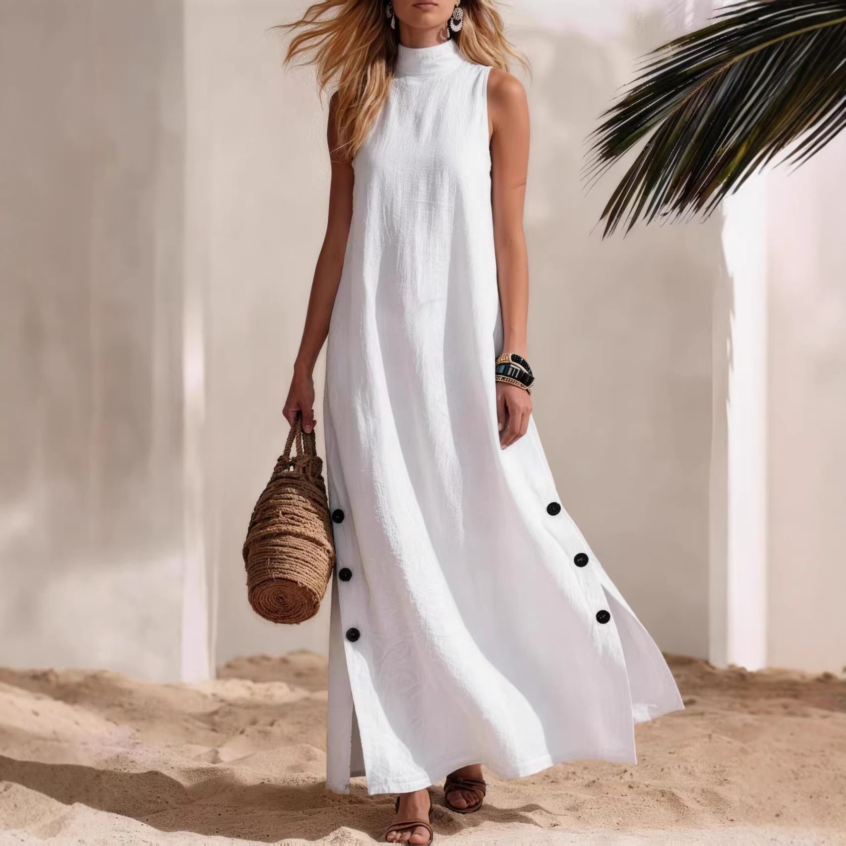 FitiqueFit sleeveless midi dress with side slits and loose fit, shown on a model in a casual outdoor setting.