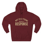 Black "Not Everything Needs a Response" hoodie by Wear Your Worship from the SEEN. Identity Line, featuring bold white text on the front.