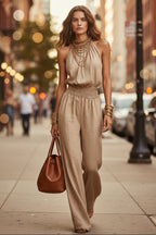 Women's sleeveless backless lace-up halter wide-leg jumpsuit, casualwear by Plush Fashion Hub, shown in a stylish, relaxed fit.