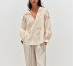 Women’s spring floral embroidered mini shirt by Bella Mia, featuring delicate embroidery and a lightweight, stylish design.