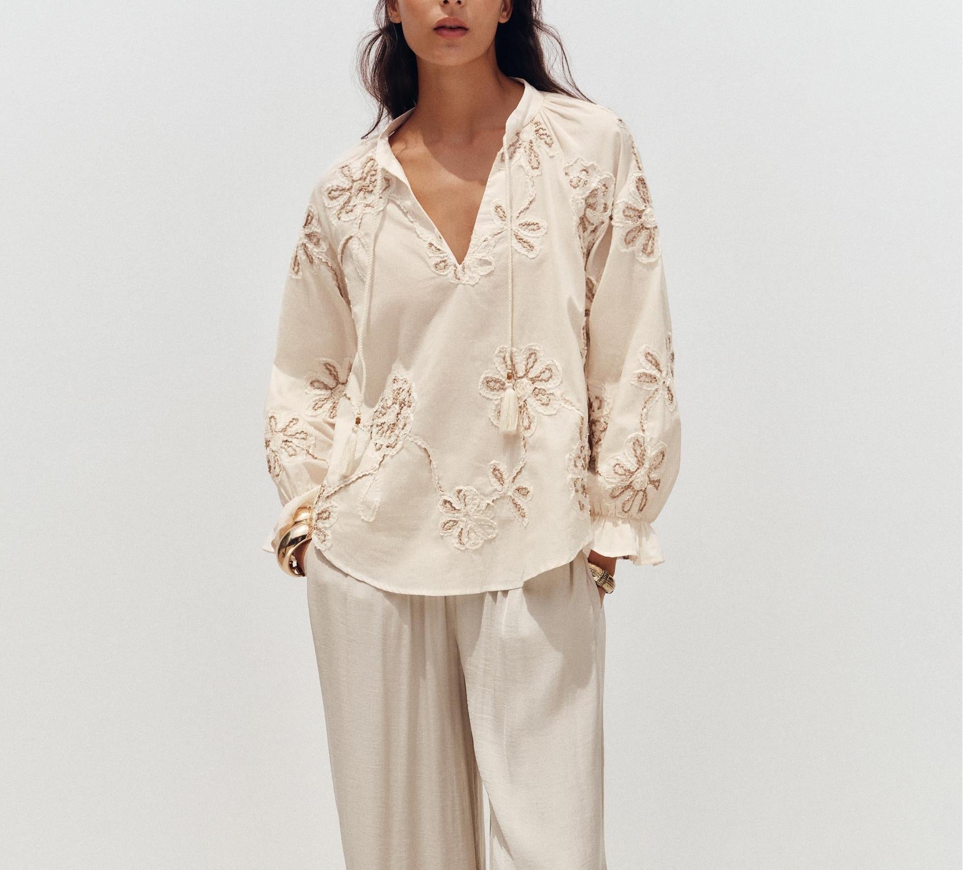 Women’s spring floral embroidered mini shirt by Bella Mia, featuring delicate embroidery and a lightweight, stylish design.