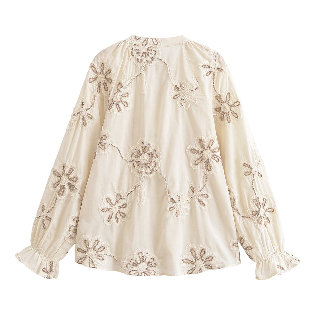 Women’s floral embroidered mini shirt by Bella Mia, featuring spring-inspired sweet floral design and lightweight fabric.