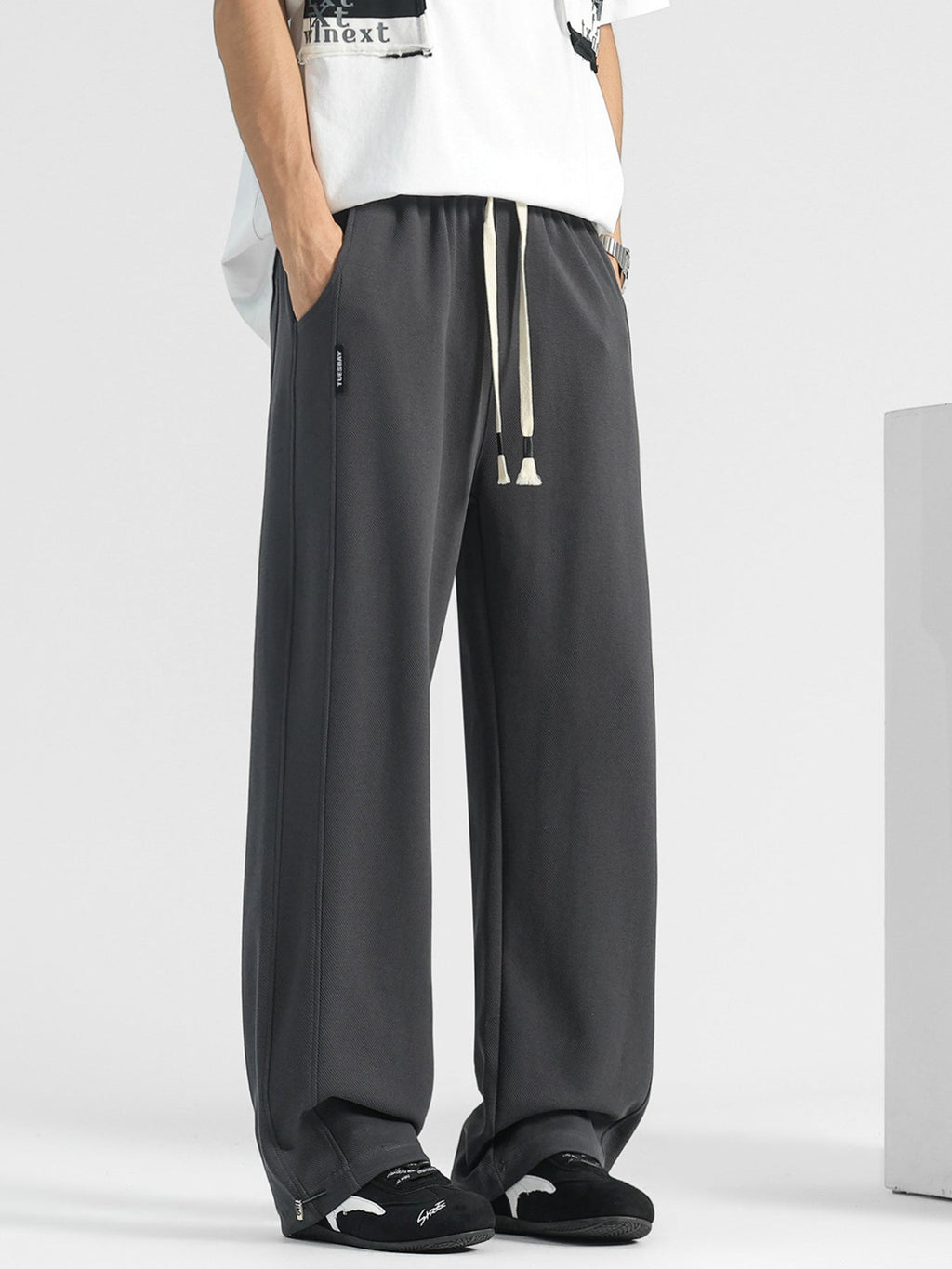 Men's plus size casual loose-fit drawstring pants by Shopimist, showing the comfortable, relaxed fit and adjustable waistband.