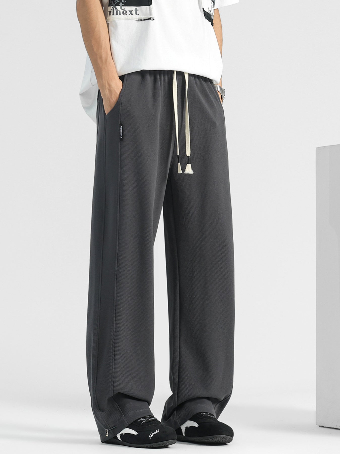 Men's plus size casual loose-fit drawstring pants by Shopimist, showing the comfortable, relaxed fit and adjustable waistband.