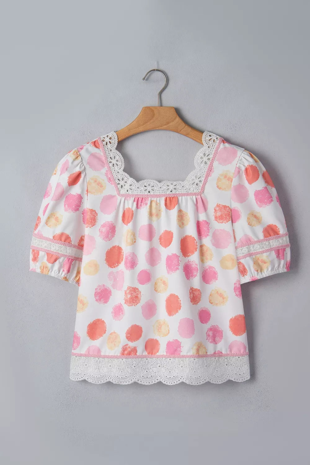 Polka dot lace trim square neck puff sleeve blouse by Plush Fashion Hub, featuring a feminine design with ruffled sleeves and delicate lace details.