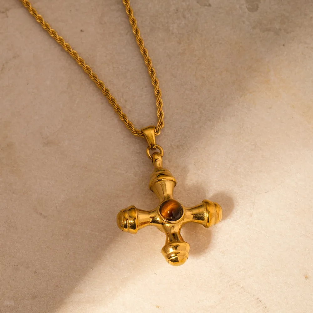 Gold-plated stainless steel cross pendant necklace with a sleek design, perfect for religious or stylish accessories.