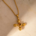Gold-plated stainless steel cross pendant necklace with a sleek design, perfect for religious or stylish accessories.